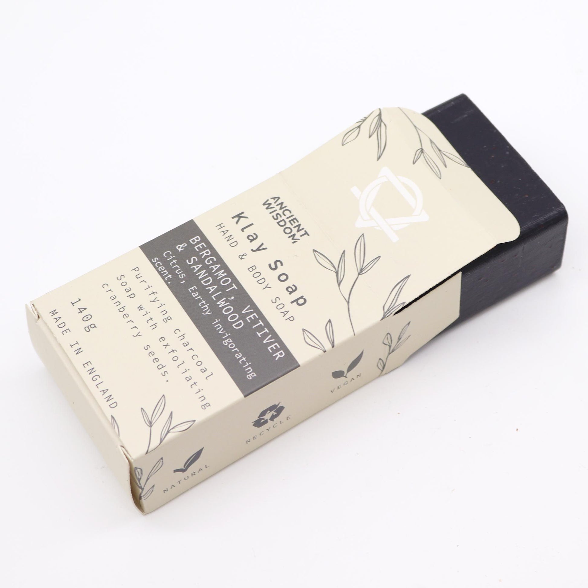 Jabón artesanal de arcilla con bergamota y sándalo. Vegano y natural, para limpieza profunda y piel equilibrada.