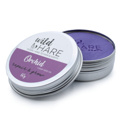 Champú sólido redondo Wild Hare en lata metálica reutilizable, ecológico y sin plásticos. De orquídea que  fortalece, estimula y repara el cabello