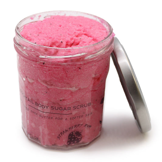 Exfoliante natural con azúcar para eliminar impurezas y revitalizar la piel, con aroma a ron de fresa