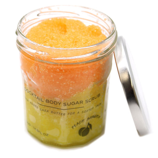 Exfoliante natural con azúcar para eliminar impurezas y revitalizar la piel, con aroma de sangría de melocotón