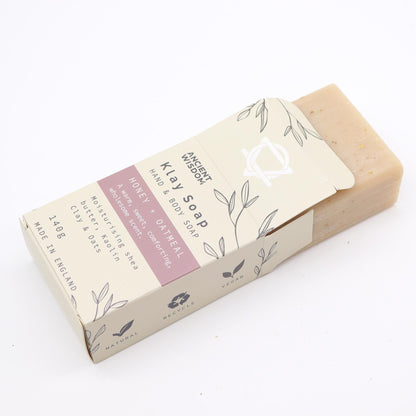 Jabón artesanal de arcilla con miel y avena. Vegano y natural, para limpieza profunda y piel equilibrada.